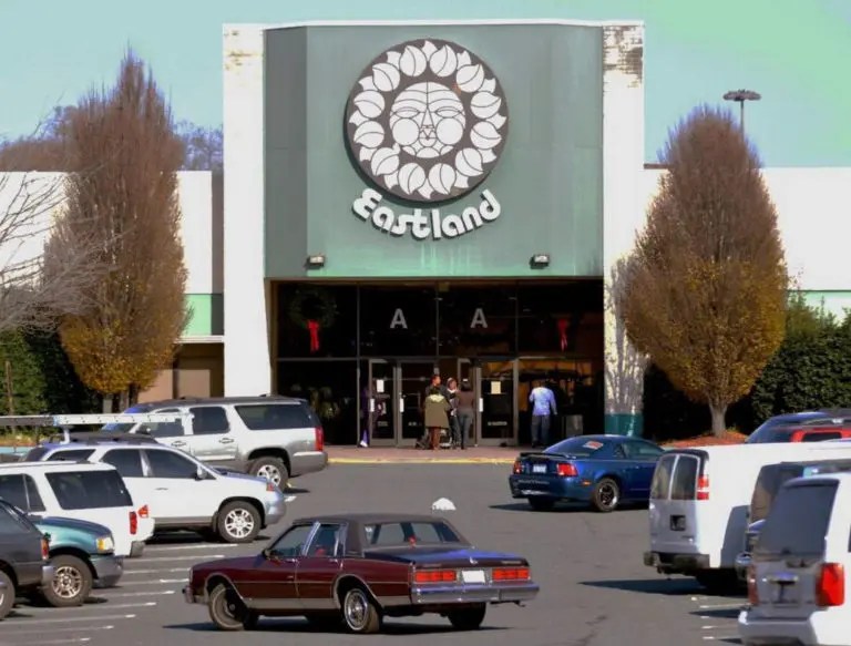 An image of the parking lot of Eastland showing the iconic Eastland Mall sign.