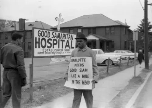 A photo of protestors outside of Good Samaritan during the Civil Rights Movement.