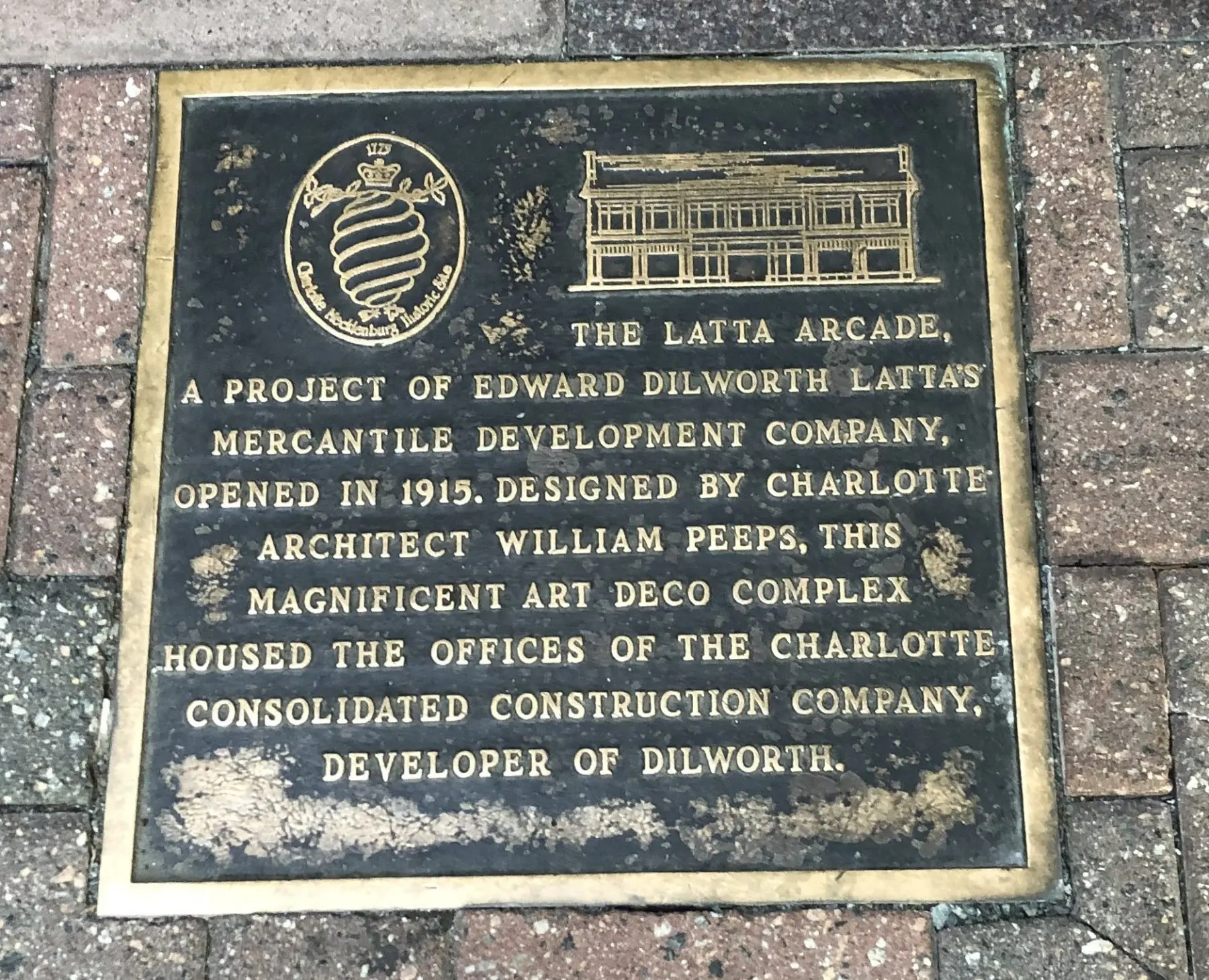 An image of the historic marker at Latta Arcade.