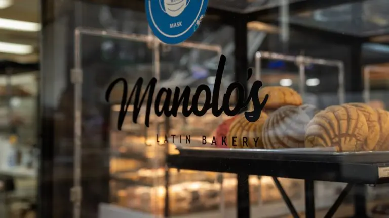 A photo of the window at Manolo’s Bakery.