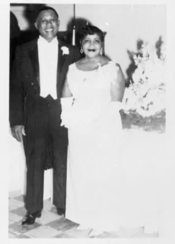 Jimmie and Minnie McKee pictured together at their 25th Wedding Anniversary held at the Excelsior Club in 1964.