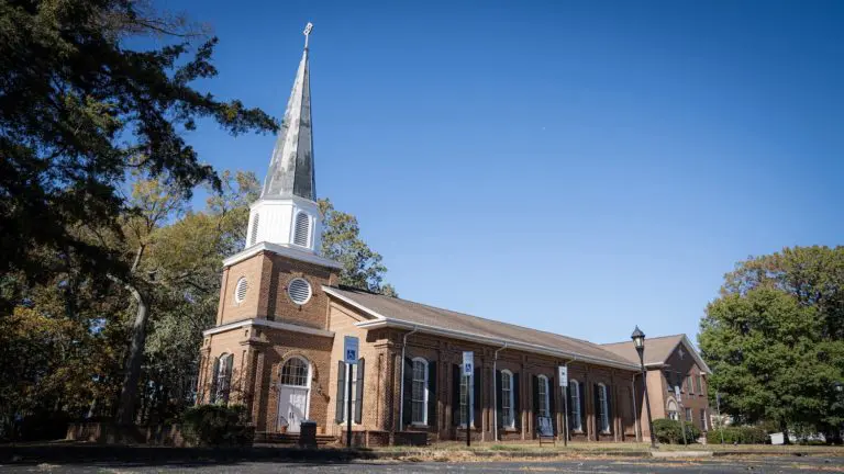 An exterior image of Sugaw Creek Presbyterian Church shows the steeple, 2023.