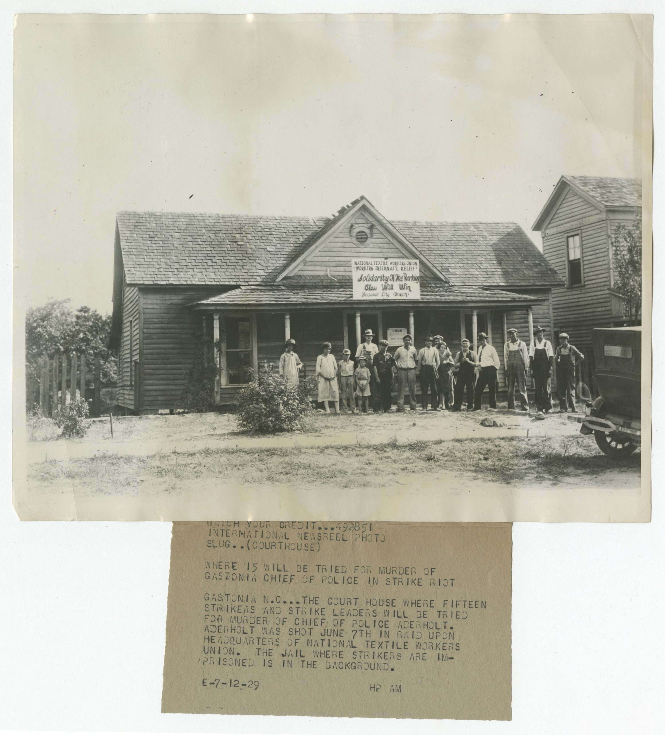 Photograph of Loray strikers outside of strike headquarters, 1929