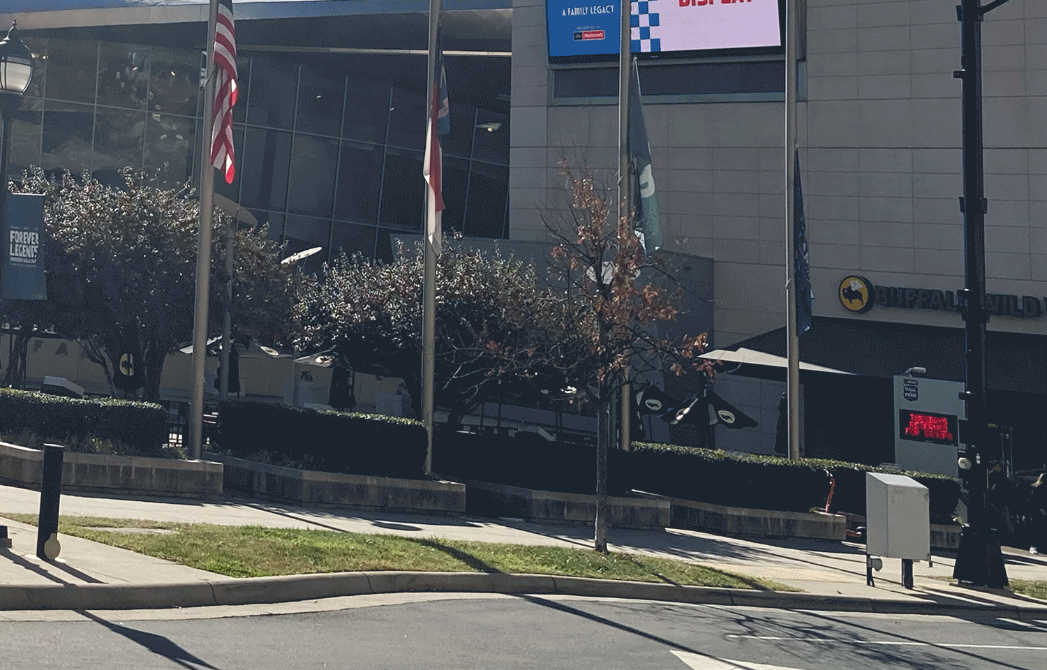 Animated image of the location of Brevard Street Library today with the historic photo overlayed