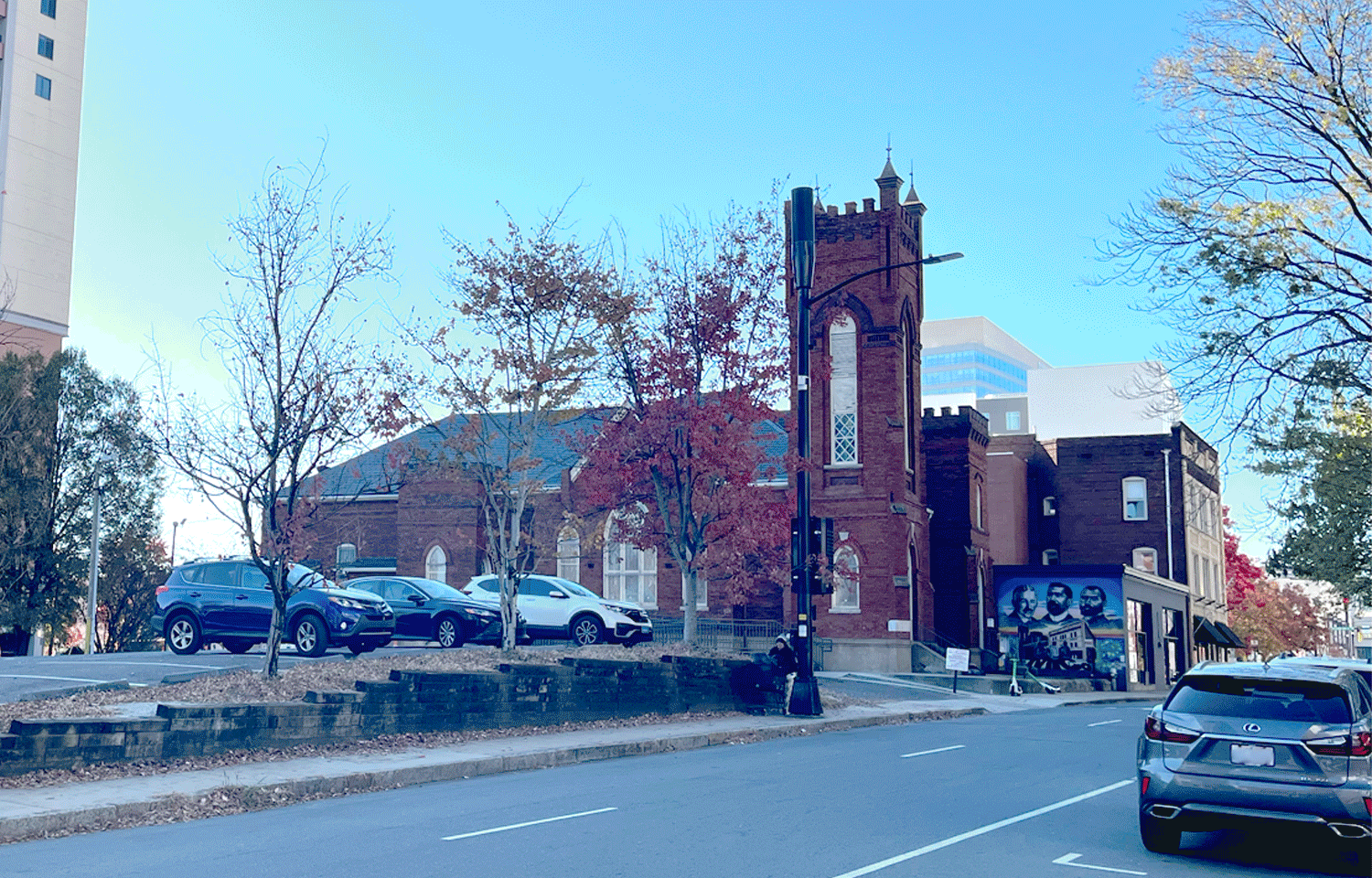 Animated image of the location of the J.T. Williams House, Grace AME Zion Church, and the Mecklenburg Investment Company building today with the historic photo overlayed