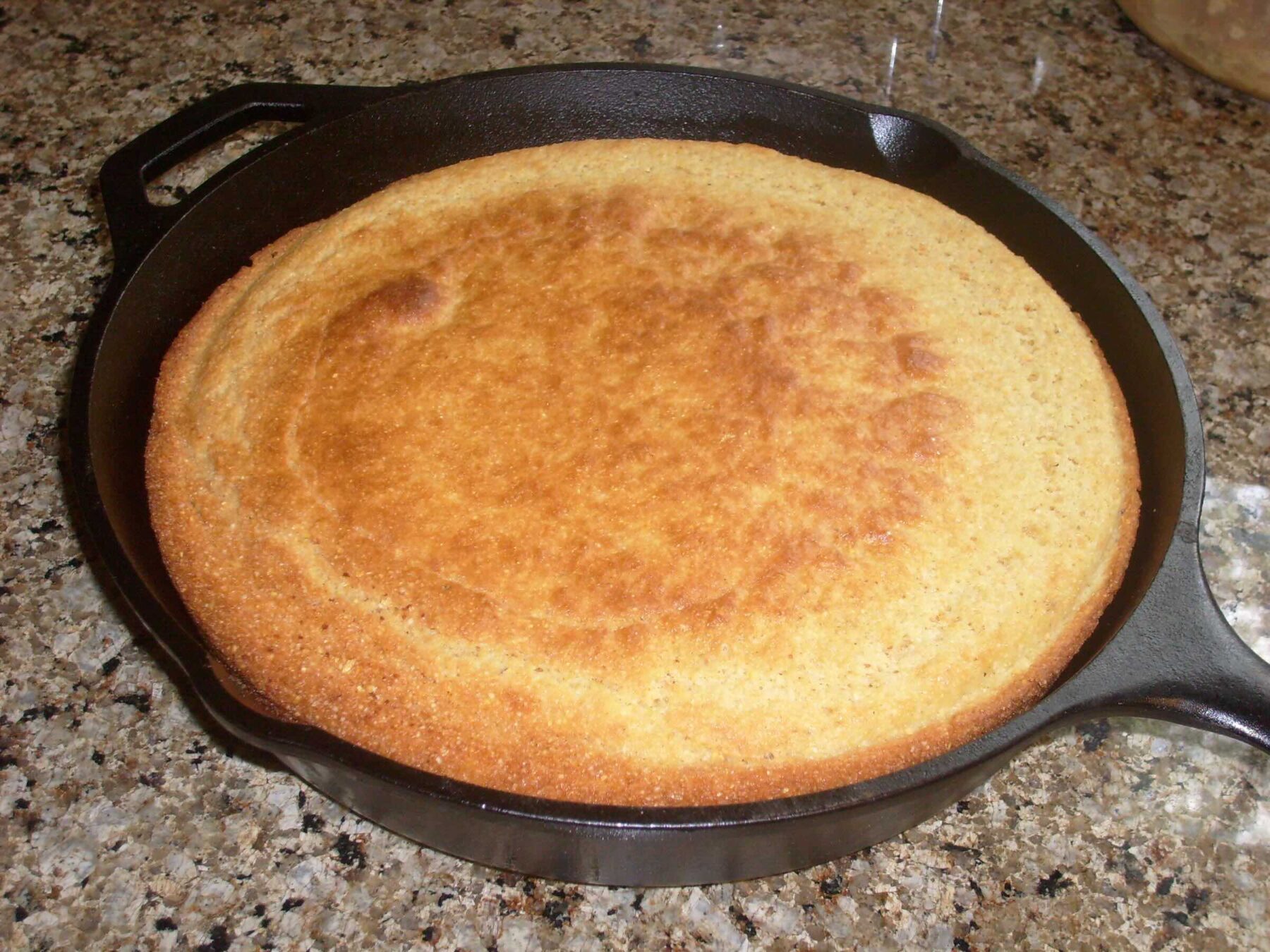 A picture of baked cornbread.